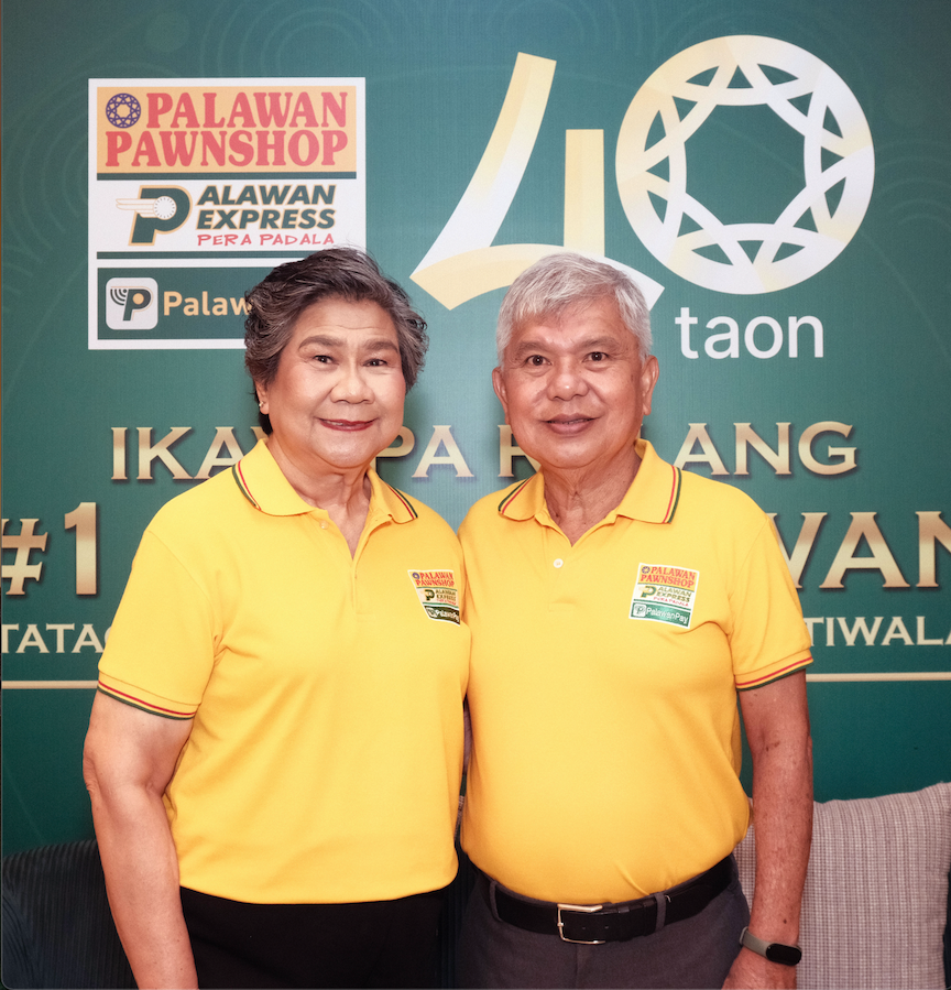 Top executives of Palawan Group of Companies led by its founder, Bobby Castro (right), and his wife Angelita (co-founder)