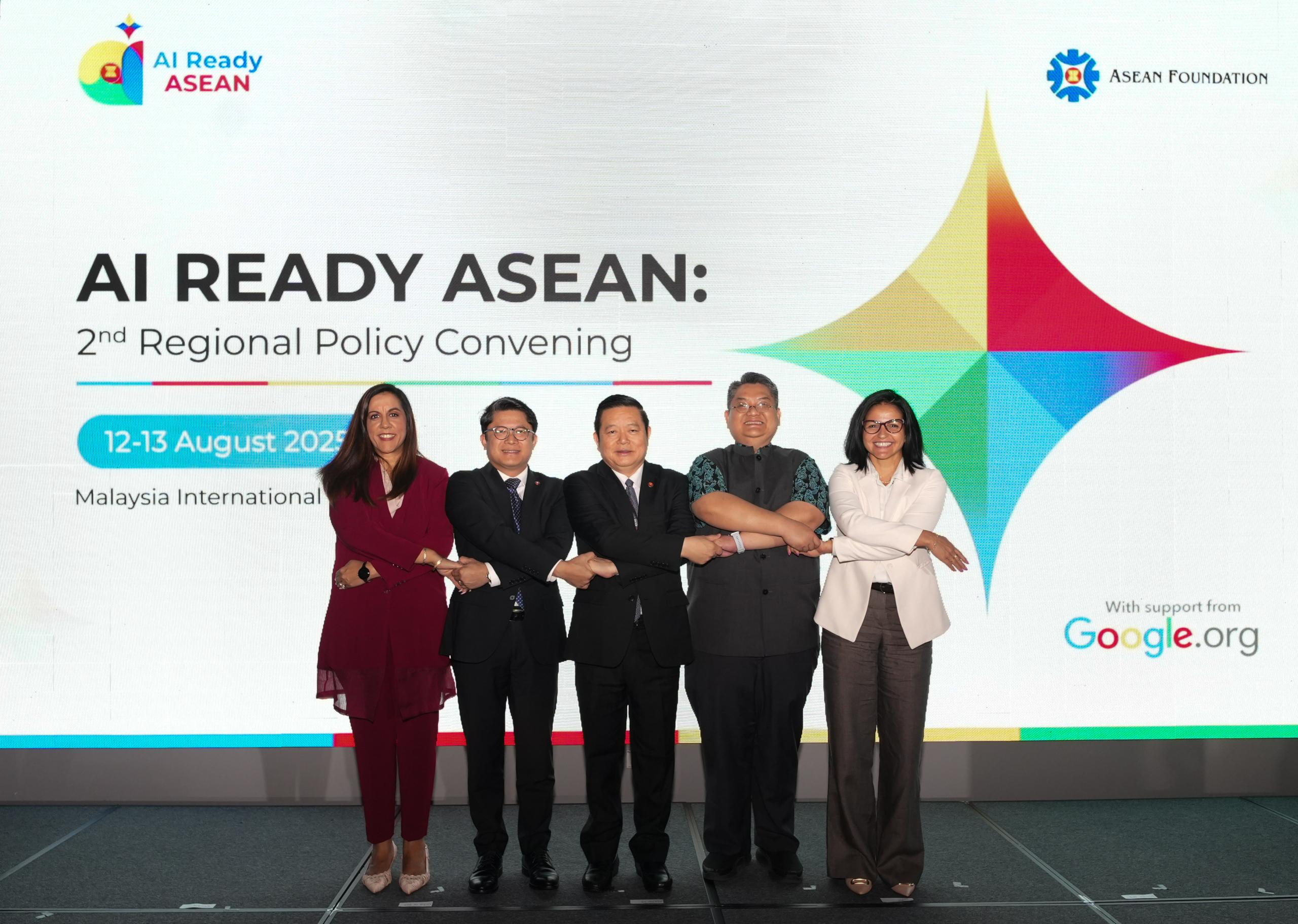 Photo shows Sapna Chadha (left), Vice President, Southeast Asia and South Asia Frontier, Google Asia Pacific, while doing the human chain link with other dignitaries at the AI Ready ASEAN 2025