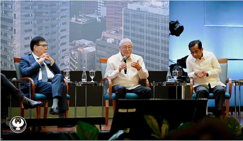 BSP Governor Remolona (center) flanked by 2 other executives, while speaking at the "Economic Forum 2025," an event organized by Economic Journalists Association of the Philippines (EJAP)
