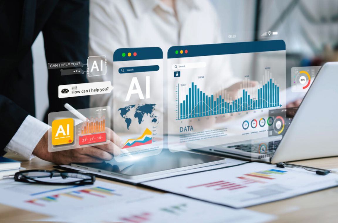 People working on AI-run computer screens to show how personal financial management apps are helping with budgeting and savings