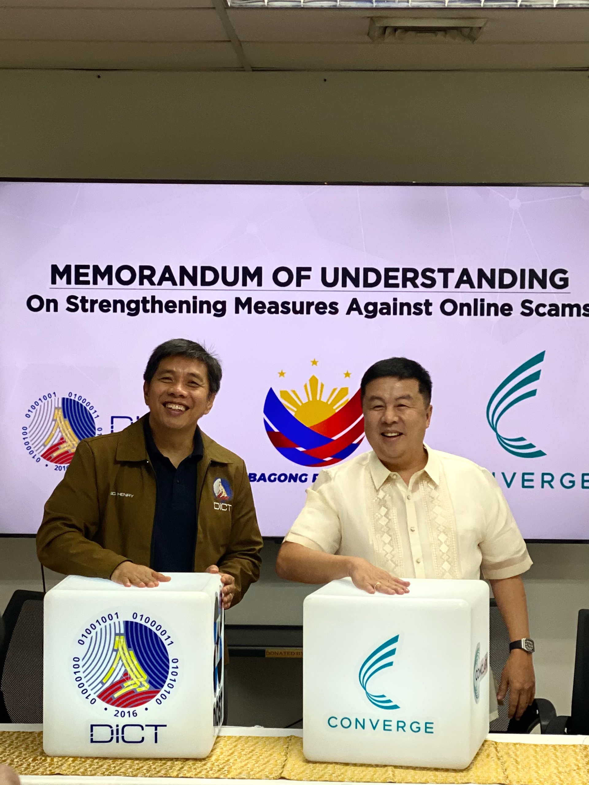 DICT Secretary Henry Aguda and Converge CEO and PBC&E chairman Dennis Anthony Uy pose for a photo during the launch of the 51st Philippine Business Conference & Expo in Taguig City.