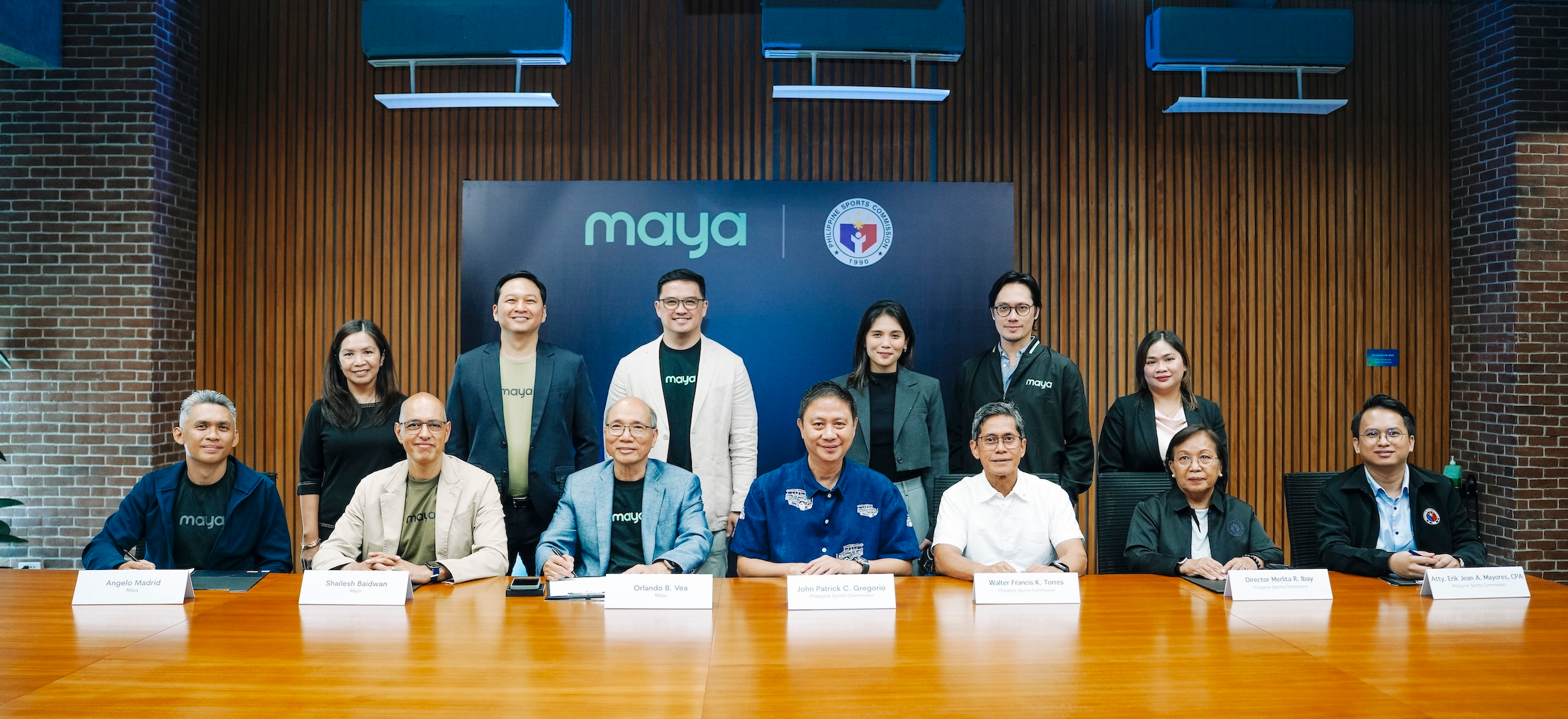 Maya Group's Shailesh Baidwan (2nd from left) joins PSC executives as they sign a partnership meant to empower PH sports with digital financial tools