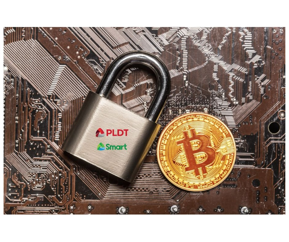 Padlock with PLDT and Smart logos together with a Bitcoin