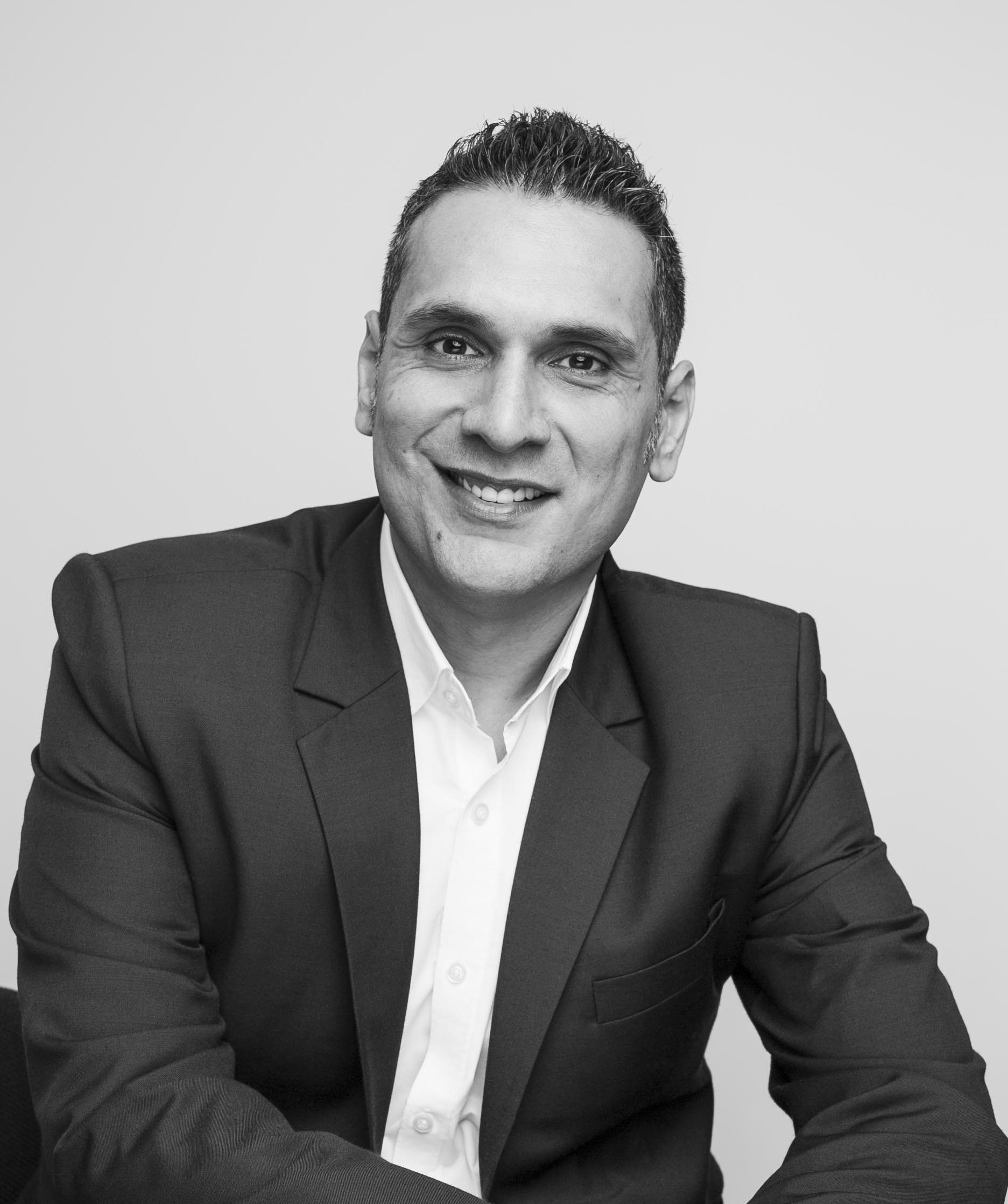 B&W photo of Sunny Gandhi, who has been tapped by AMD to serve as the senior director of its commercial channel for Asia Pacific and Japan