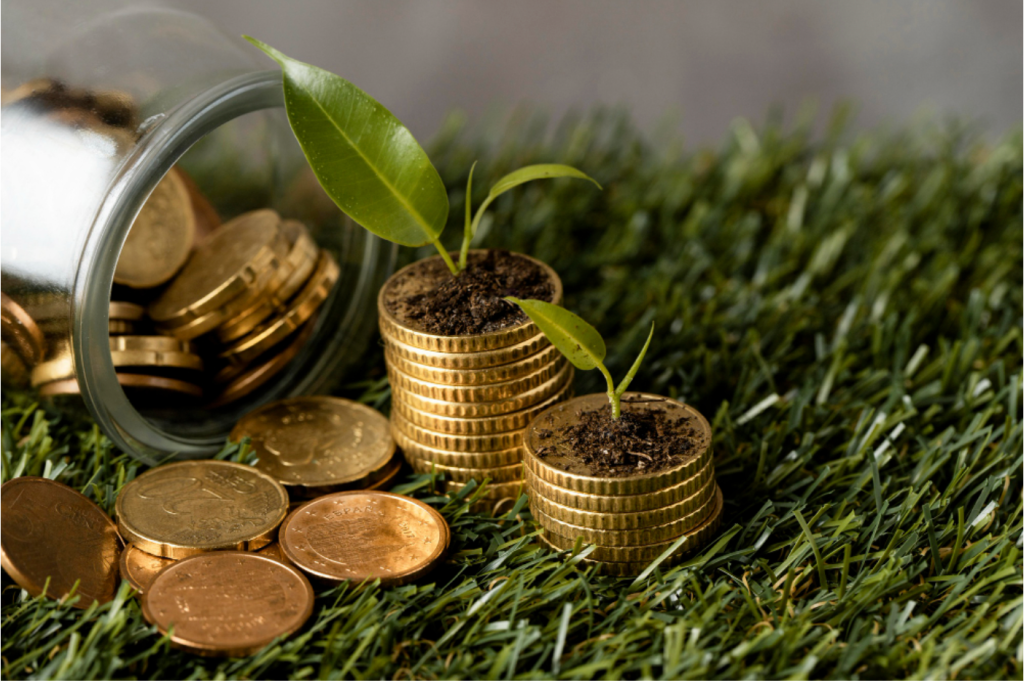 Coins spilling over to the grass to illustrate the rise of sustainable investing and ESG integration in PH corporations