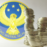 A stack of coins and the BSP logo as the central bank reports a stable PH economy thanks to growing foreign direct investment