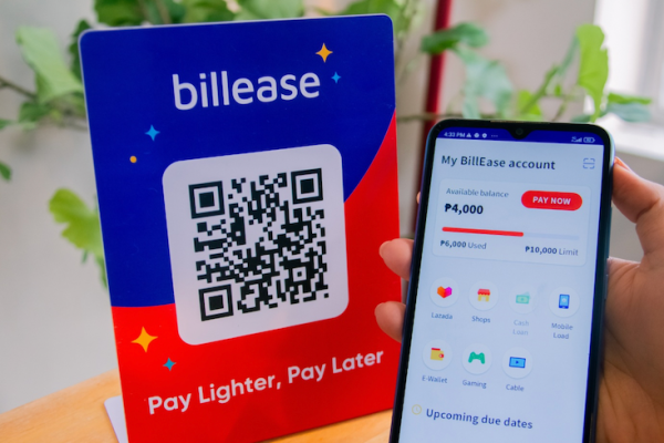 Image of a handheld mobile phone used to scan a QRPh code for buy-now-pay-later service as Billease unveils its everyday, pay-later and tap-to-pay services via QRPh