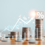 Image of stacked coins with line graph to illustrate digital bank interest rates