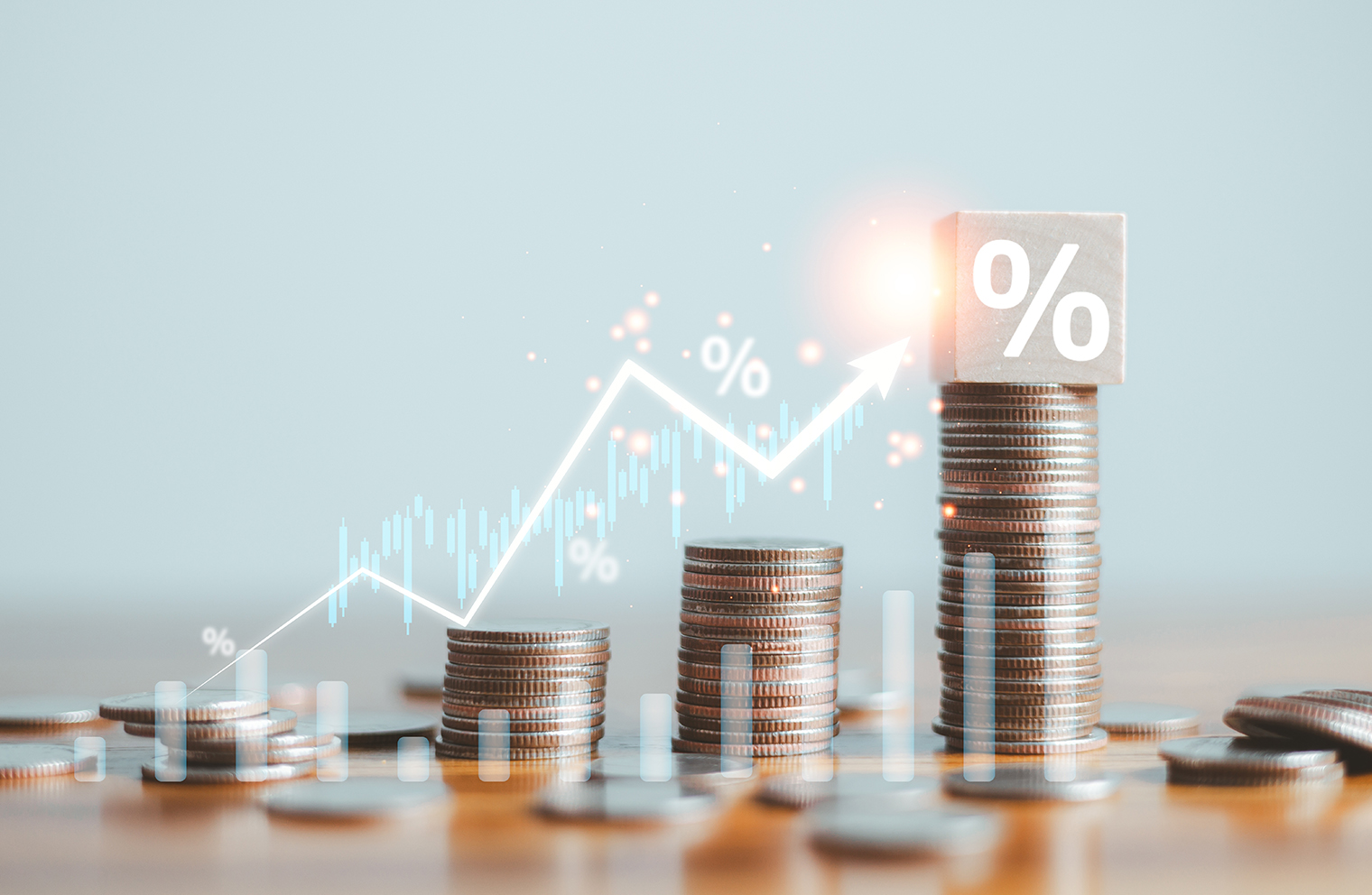 Image of stacked coins with line graph to illustrate digital bank interest rates