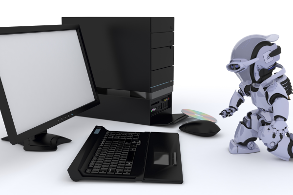 A miniature robot working wonders outside a desktop is used to illustrate the advantages of AI PCs
