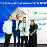 Key executives of Palawan Group of Companies strike a pose after winning at MarkeTech Asia Awards 2025