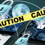 A laptop with locks around it is used to highlight need for caution as the SEC sounds alarm on rise of unauthorized online investment schemes