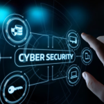 A man touches a screen with the words cyber security as the country celebrates Cybersecurity Awareness Month