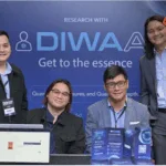 Executives of Diwa AI pose for a group pic after showcasing the future of research at the IGNITE 2025: Gateway ASEAN event
