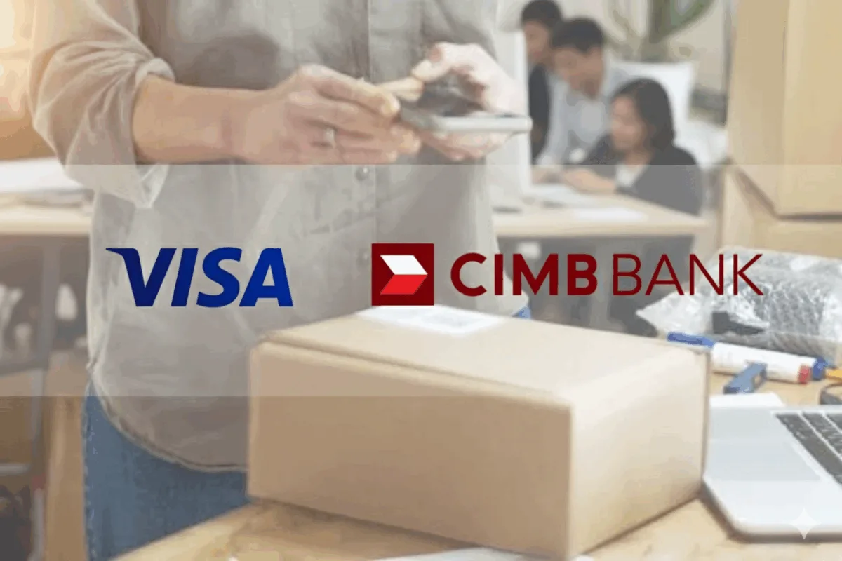 Logos of CIMB Bank and Visa on top of a photo of a man holding a mobile phone over a gift box