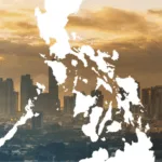 Map of the Philippines amid tall buildings as the BSP reports a stable economy thanks to growing foreign direct investment