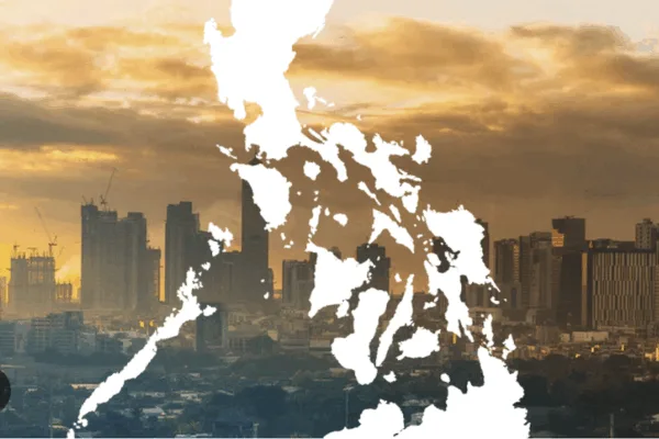 Map of the Philippines amid tall buildings as the BSP reports a stable economy thanks to growing foreign direct investment