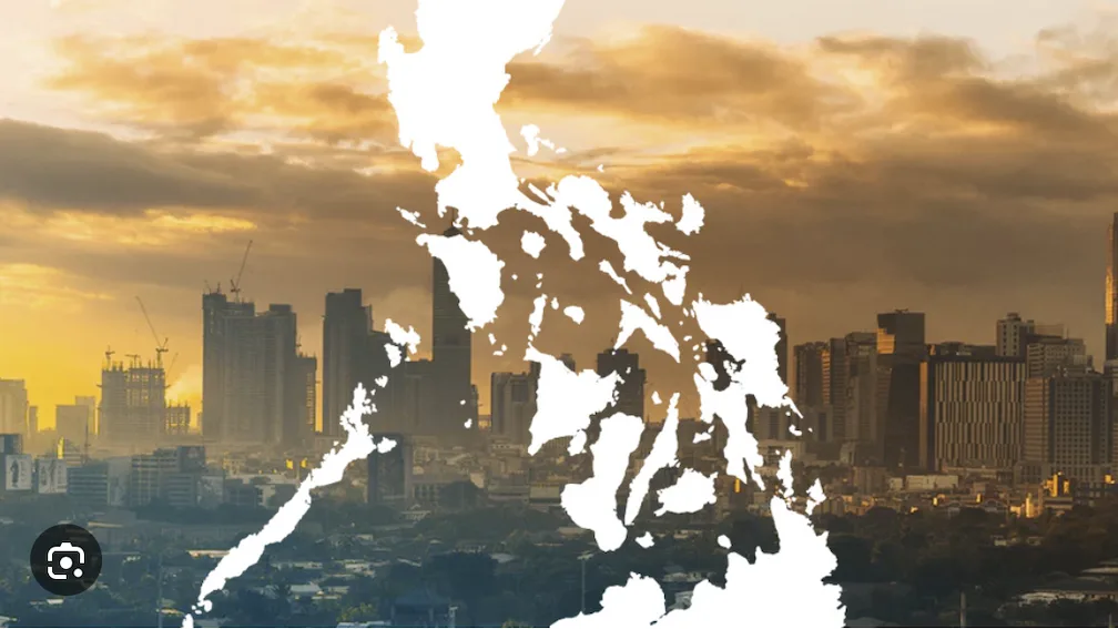 Map of the Philippines amid tall buildings as the BSP reports a stable economy thanks to growing foreign direct investment