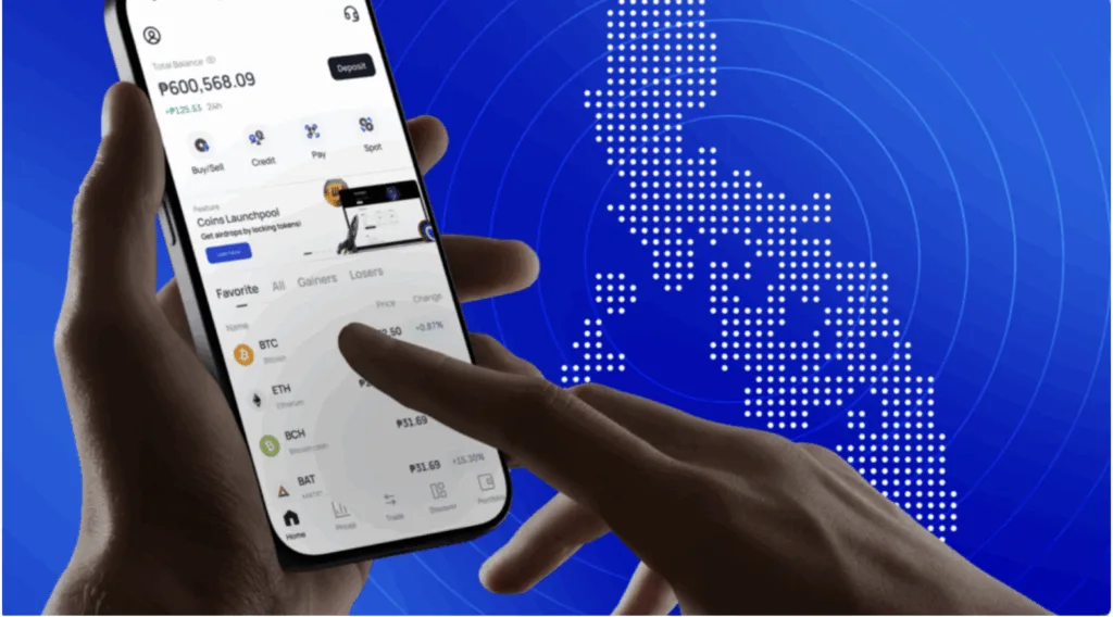 With PH map in the background, a mobile phone is used here to transfer money, as Coins.ph, FinFan team up to boost PH–Vietnam remittances with faster, USD-based transfers