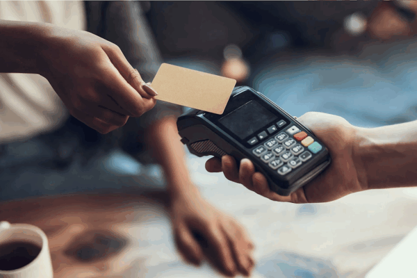 Image of a card and a POS terminal being used for digital transaction as HitPay, Visa team up to fast-track card payments adoption among Filipino SMBs