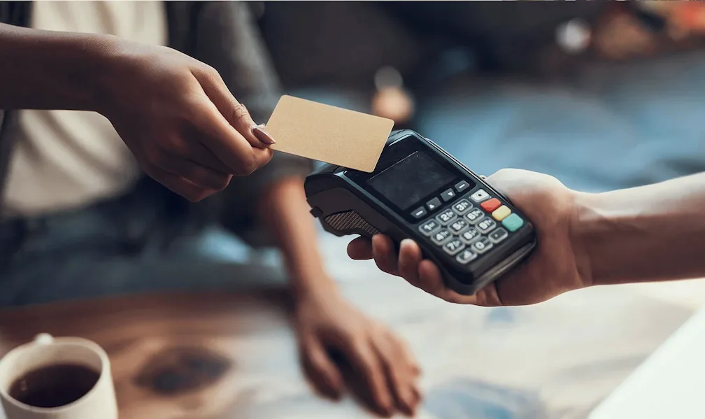 Image of a card and a POS terminal being used for digital transaction as HitPay, Visa team up to fast-track card payments adoption among Filipino SMBs
