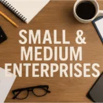 Image of a desk with a cup, calculator and the words "Small & Medium Enterprises" to illustrate how ManageEngine’s 40% cloud surge is powering new digital opportunities for PH SMEs