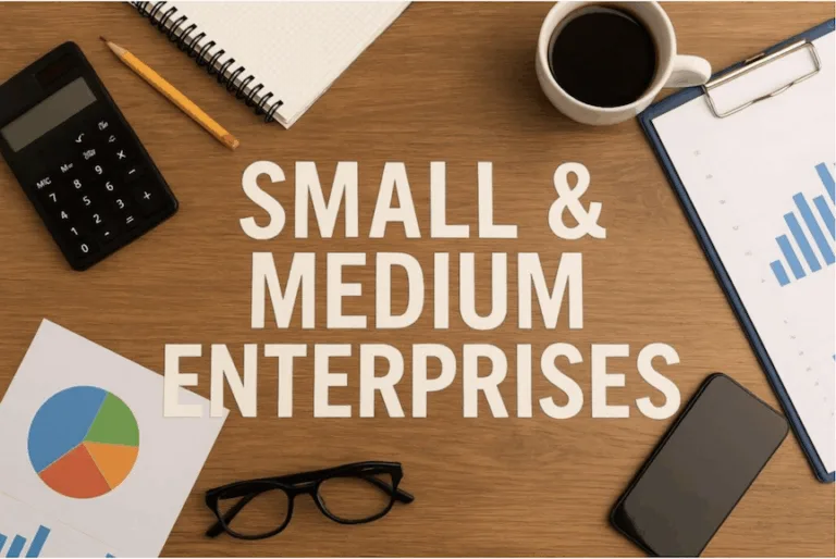 Image of a desk with a cup, calculator and the words "Small & Medium Enterprises" to illustrate how ManageEngine’s 40% cloud surge is powering new digital opportunities for PH SMEs