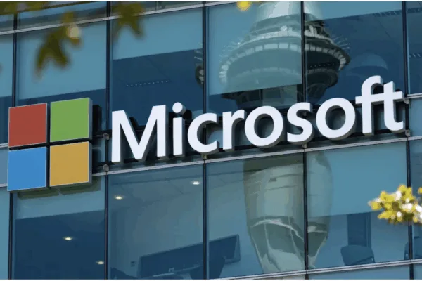 Logo of Microsoft posted on a window to show its campaign against AI-driven scams