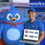 A man holding a laptop smiles beside a mascot as PayRex expands BillEase BNPL to thousands of PH merchants