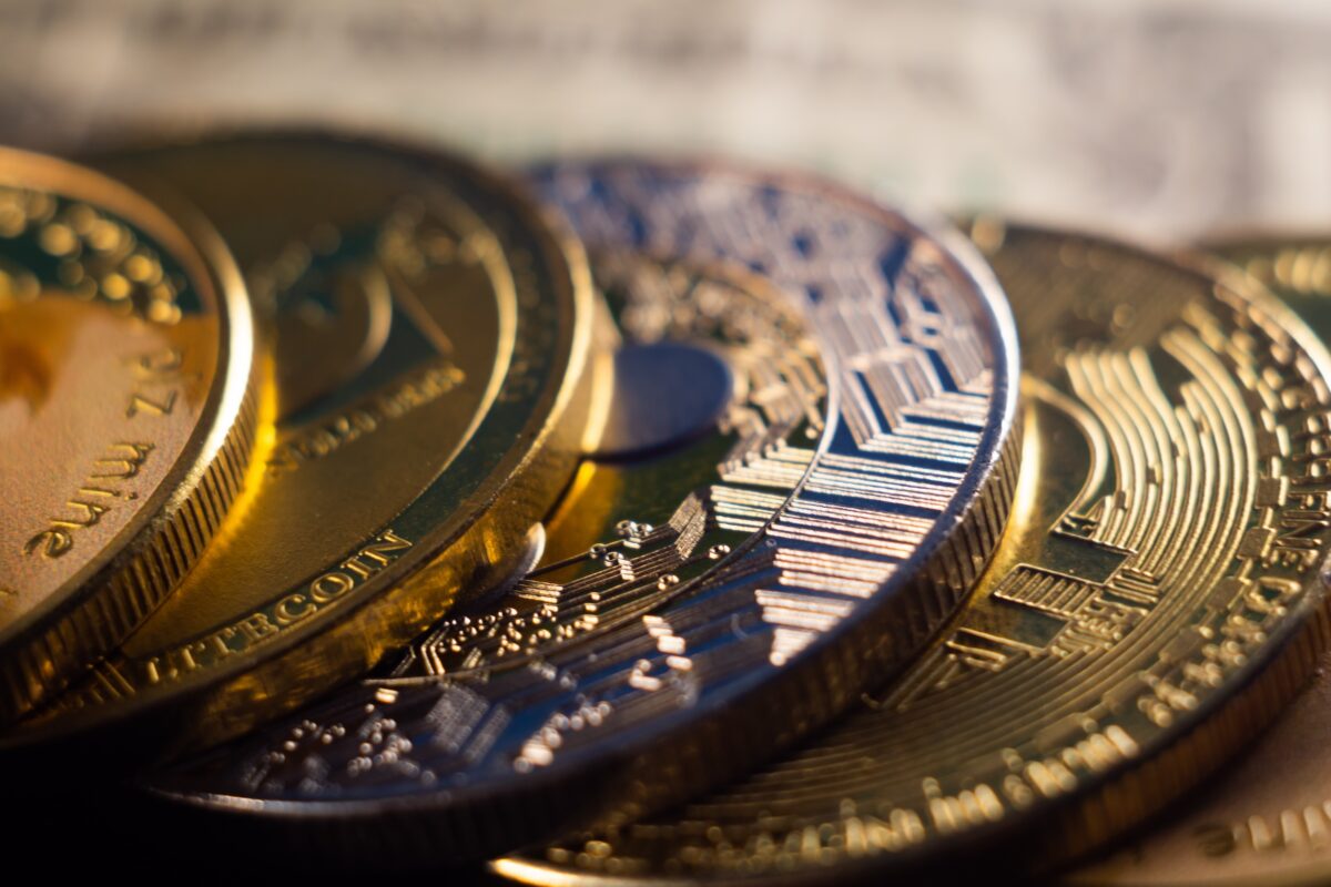 A pile of cryptocurrency coins as Coins.ph pushes stablecoins among OFWs