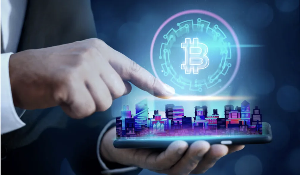 A man's fingers touches the screen to make Crypto transactions