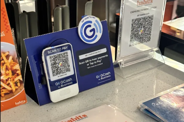 Photo of a QR code and menu for orders at Habits is used to show how GCash is quietly changing the way small businesses run