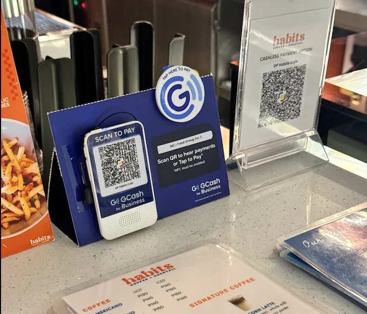 Photo of a QR code and menu for orders at Habits is used to show how GCash is quietly changing the way small businesses run