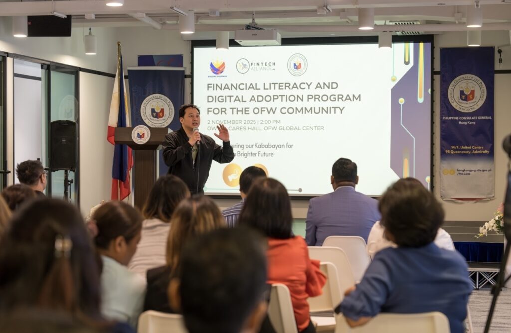A Maya executive delivering his speech to OFWs in HK as the bank leads push for smarter digital financial habits