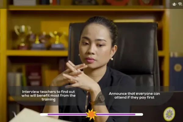 A girl looks at her laptop while waiting for new instructions as Payoneer helps Filipino creative startups go global as demand for digital talent surges