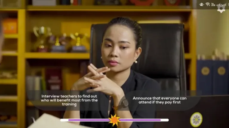 A girl looks at her laptop while waiting for new instructions as Payoneer helps Filipino creative startups go global as demand for digital talent surges