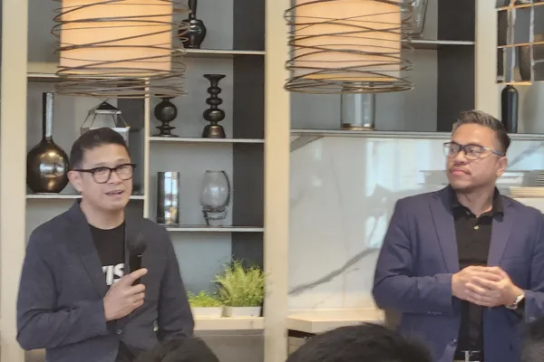 Visa executives Jeffrey Navarro and Josh Bosinos answering questions from the media