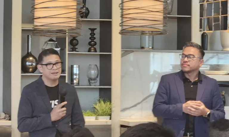 Visa executives Jeffrey Navarro and Josh Bosinos answering questions from the media