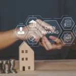 A handheld phone being used to make financial transactions as digital banking licenses close quietly in 2025 as profitability takes center stage