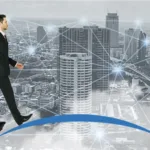 A man crossing a bridge as fintech puts MSMEs at the center, but access gaps still persist