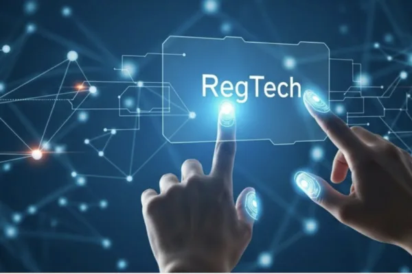 Image of 2 hands touching a screen to illustrate the quiet rise of RegTech in PH