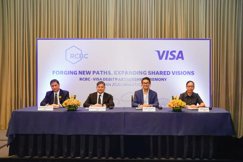Photo of RCBC First Senior Vice President and Head of the Transaction Banking Group Martin Tirol, President and Chief
Executive Officer Reggie Cariaso, Visa Philippines Country Manager Jeffrey Navarro and Head of Clients Rio Mayuga during the MOA-signing