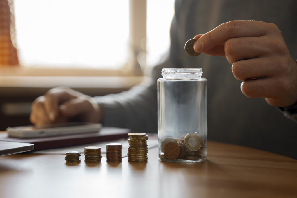 man saving money energy crisis