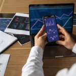 A man using fintech tools on his mobile phone to enhance digital finance