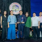 Executives of digital finance firm Maya pose with their trophy as the digital finance firm gets cited as one of Mandaluyong City’s top taxpayers