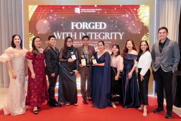 Executives and officers of the Palawan Group of Companies celebrate the group’s triple wins at the 61st ANVIL Awards