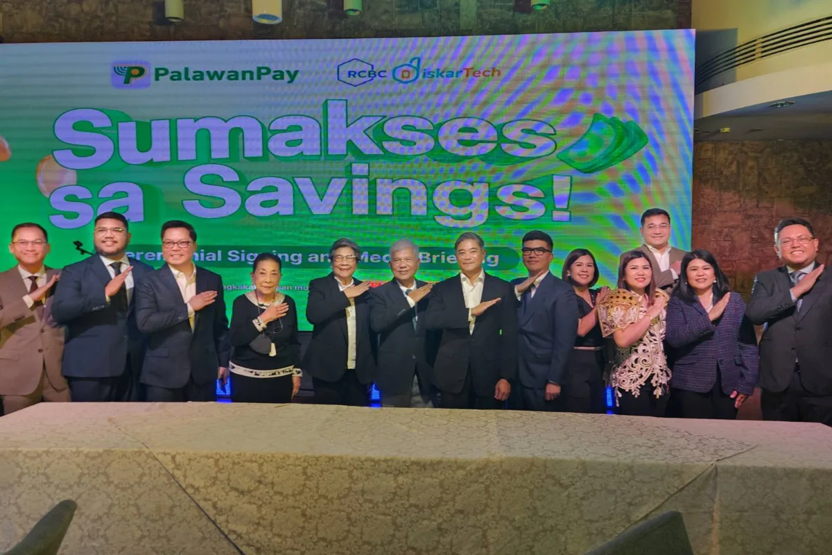 Executives of Palawan Group and RCBC do the "ready-to-serve" sign at the launch of PalaSave