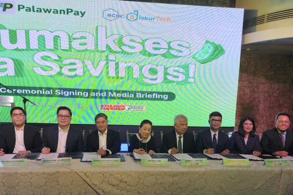 Executives of Palawan Group and RCBC do the "ceremonial signing" at the launch of PalaSave