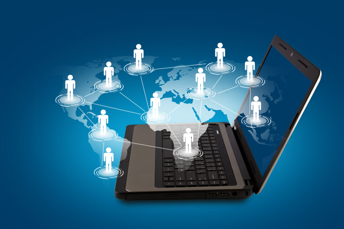 laptop which there is world people drawn
