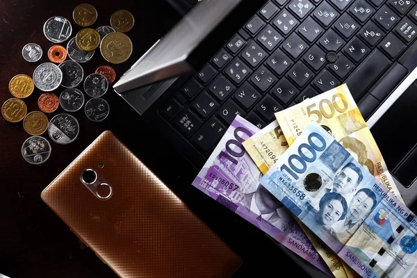 depositphotos 292139116 stock photo laptop computer coins money and
